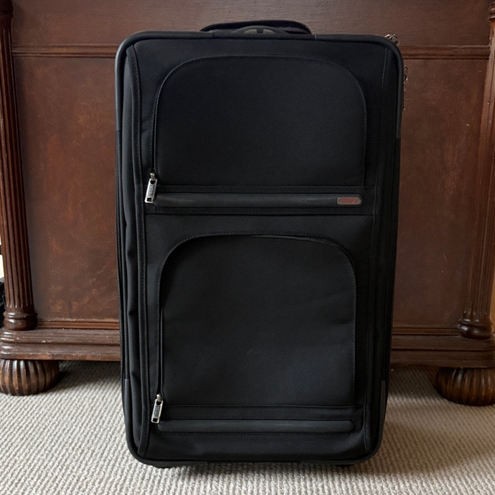 Tumi Black Travel Suitcase